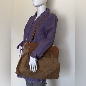 Xavagno Emanelli 🇮🇹 Y2K embossed-tooled-painted leather on modeled oil cloth.